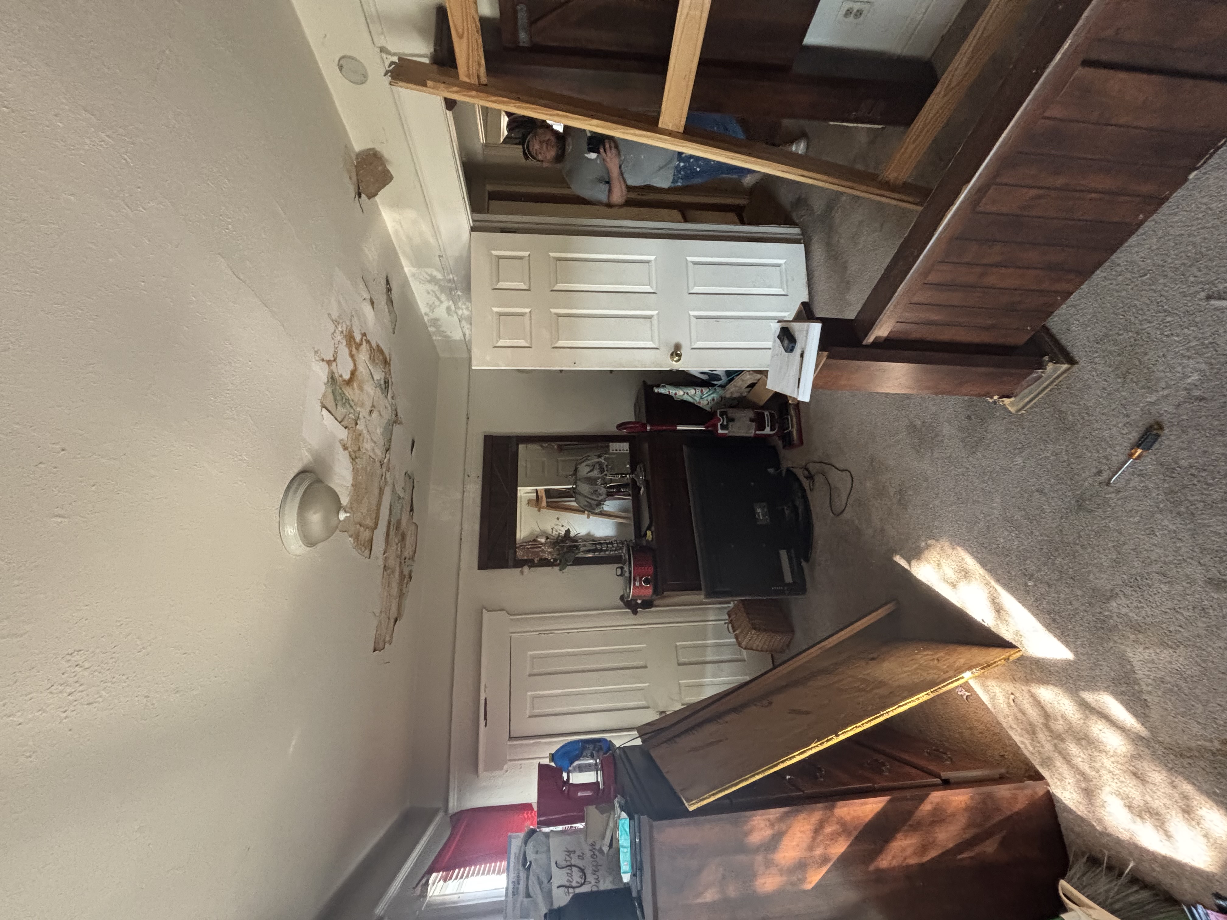 Bedroom before - collapsed ceiling, water damage